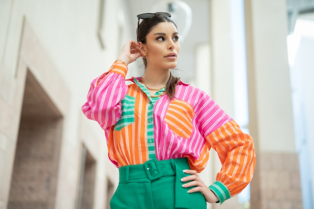 A stylish outfit featuring a harmonious blend of colors, showcasing a well-coordinated look with accessories.